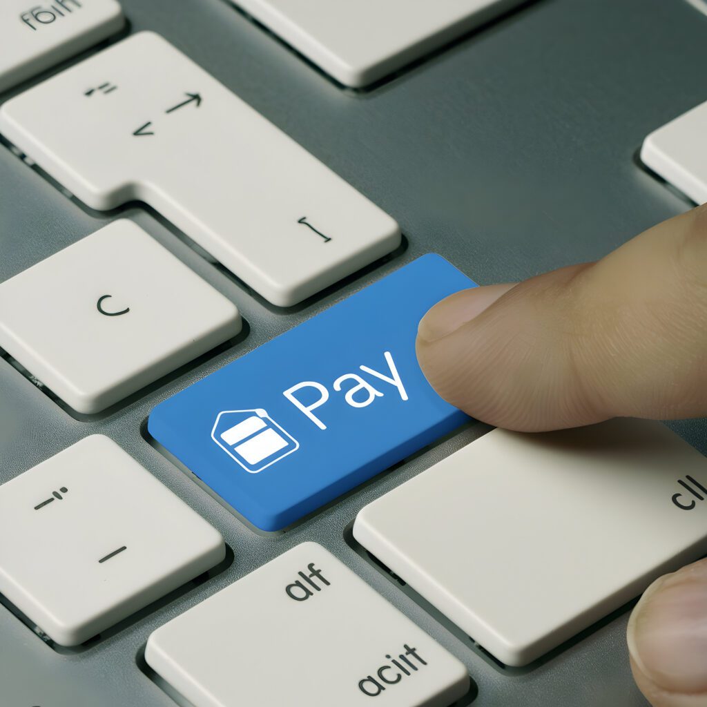 Fingers ready to push pay button